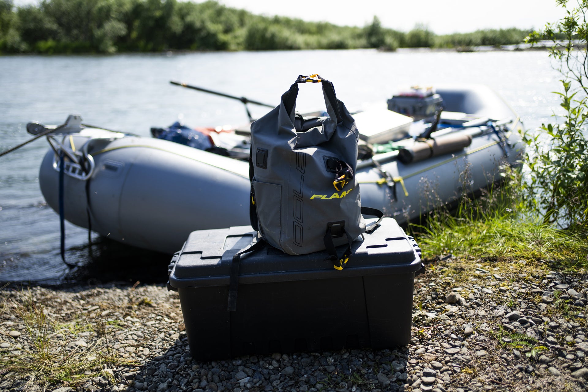 waterproof fishing storage at the edge of a river